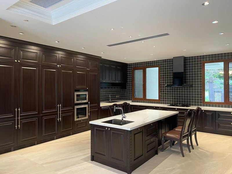 Stainless Steel European Style U-Shaped Kitchen With Multi-Functional Island And Premium Golden Hardware